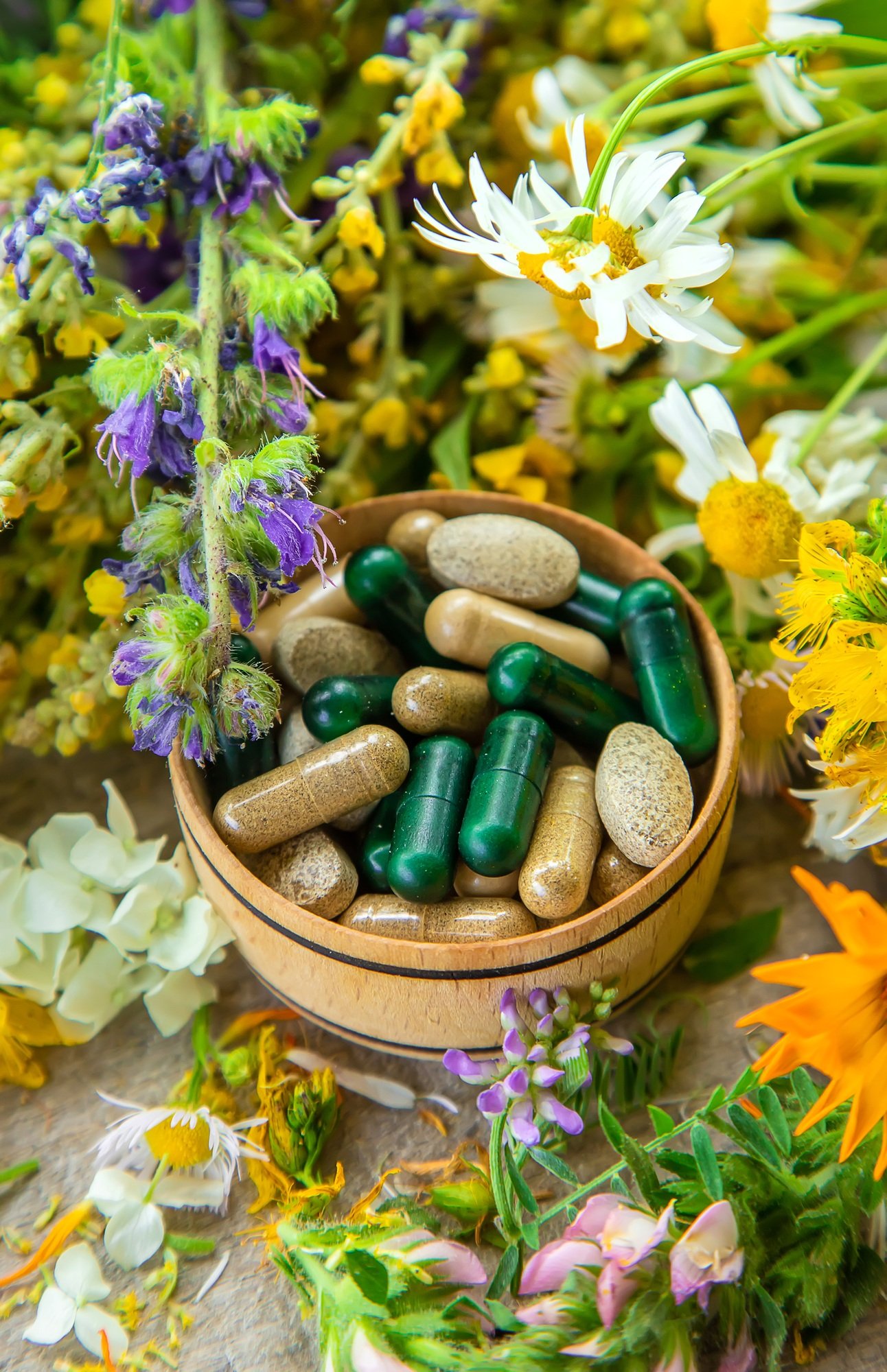 Supplements and vitamins with medicinal herbs. Selective focus.